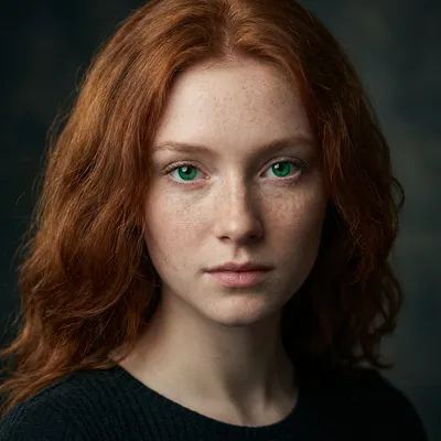 Extreme close-up portrait of a pale-skinned ginger girl with abundant natural freckles across the nose and cheeks, striking emerald green eyes with distinct irises and sharp catchlights. High-fidelity skin texture: visible skin pores, subtle peach fuzz, natural complexion, advanced subsurface scattering. Lighting path: Soft Rembrandt lighting setup utilizing a 45-degree angle large softbox, subtle rim lighting separating hair from dark blurred background. Shot on an 85mm prime lens, aperture f/1.8 for shallow depth of field, 8k UHD, clean masterwork. Extreme close-up portrait of a pale-skinned ginger girl with abundant natural freckles across the nose and cheeks, striking emerald green eyes with distinct irises and sharp catchlights. High-fidelity skin texture: visible skin pores, subtle peach fuzz, natural complexion, advanced subsurface scattering. Lighting path: Soft Rembrandt lighting setup utilizing a 45-degree angle large softbox, subtle rim lighting separating hair from dark blurred background. Shot on an 85mm prime lens, aperture f/1.8 for shallow depth of field, 8k UHD, clean masterwork.